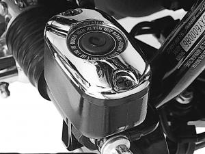 REAR MASTER CYLINDER COVER - CHROME<br />Fits '06-later Dyna® non-ABS models, '06-later Softail 46425-05A